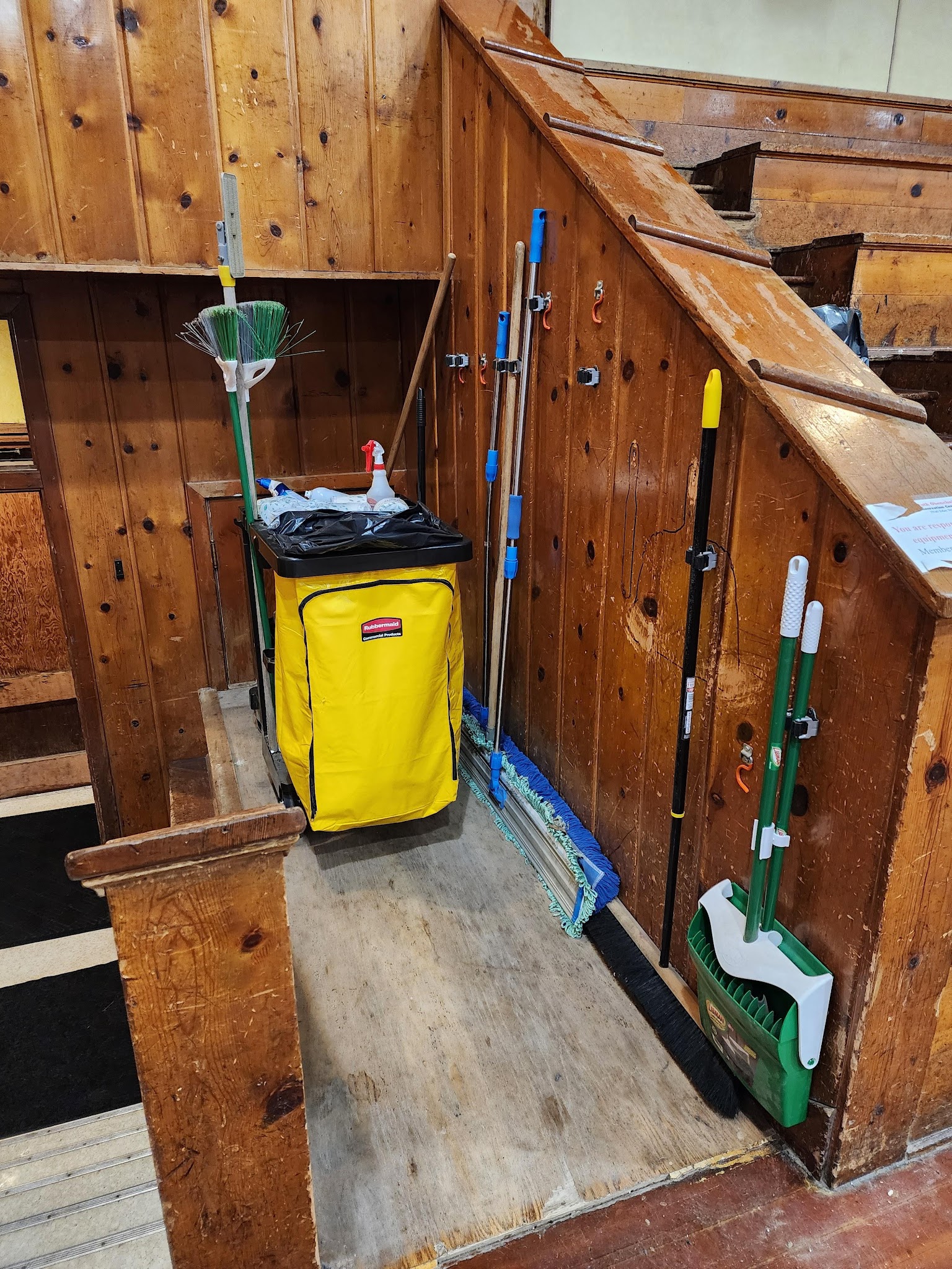 Contract photo 2 showing mop and cleaning equipment placement